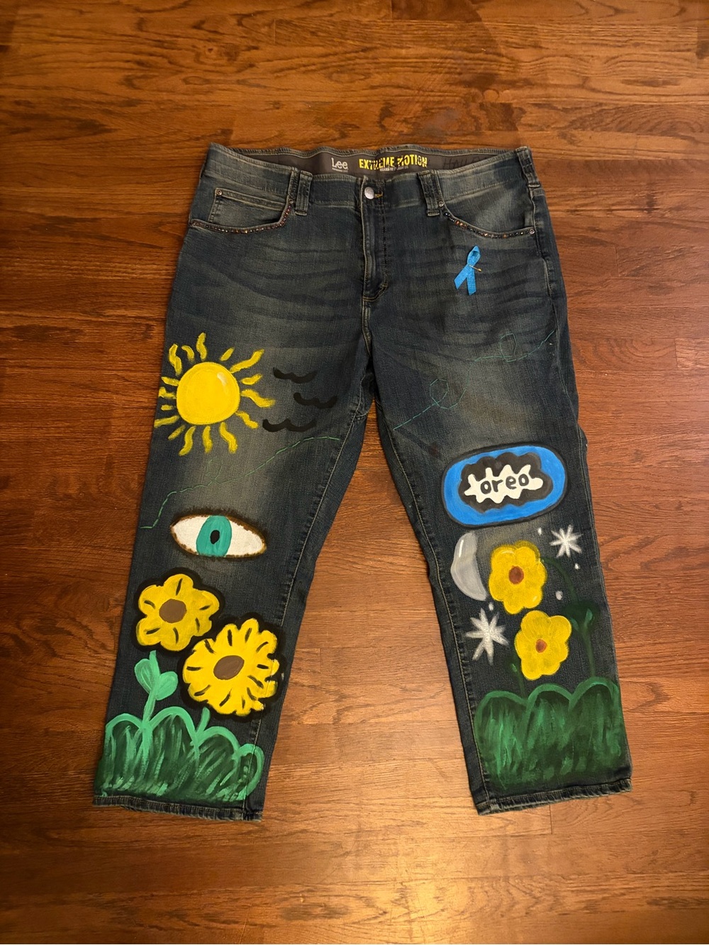 Lee Painted Denim Jeans with Bright Floral Artwork, embroidery, and bling.